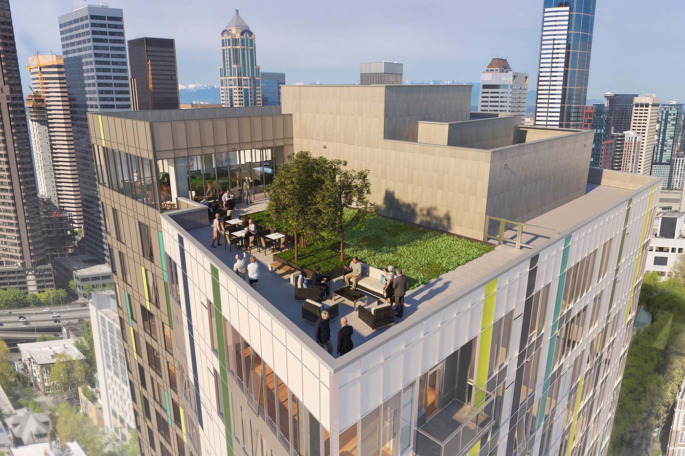 Landscaped rooftop terrace at Murano Senior Living overlooking the downtown Seattle skyline
