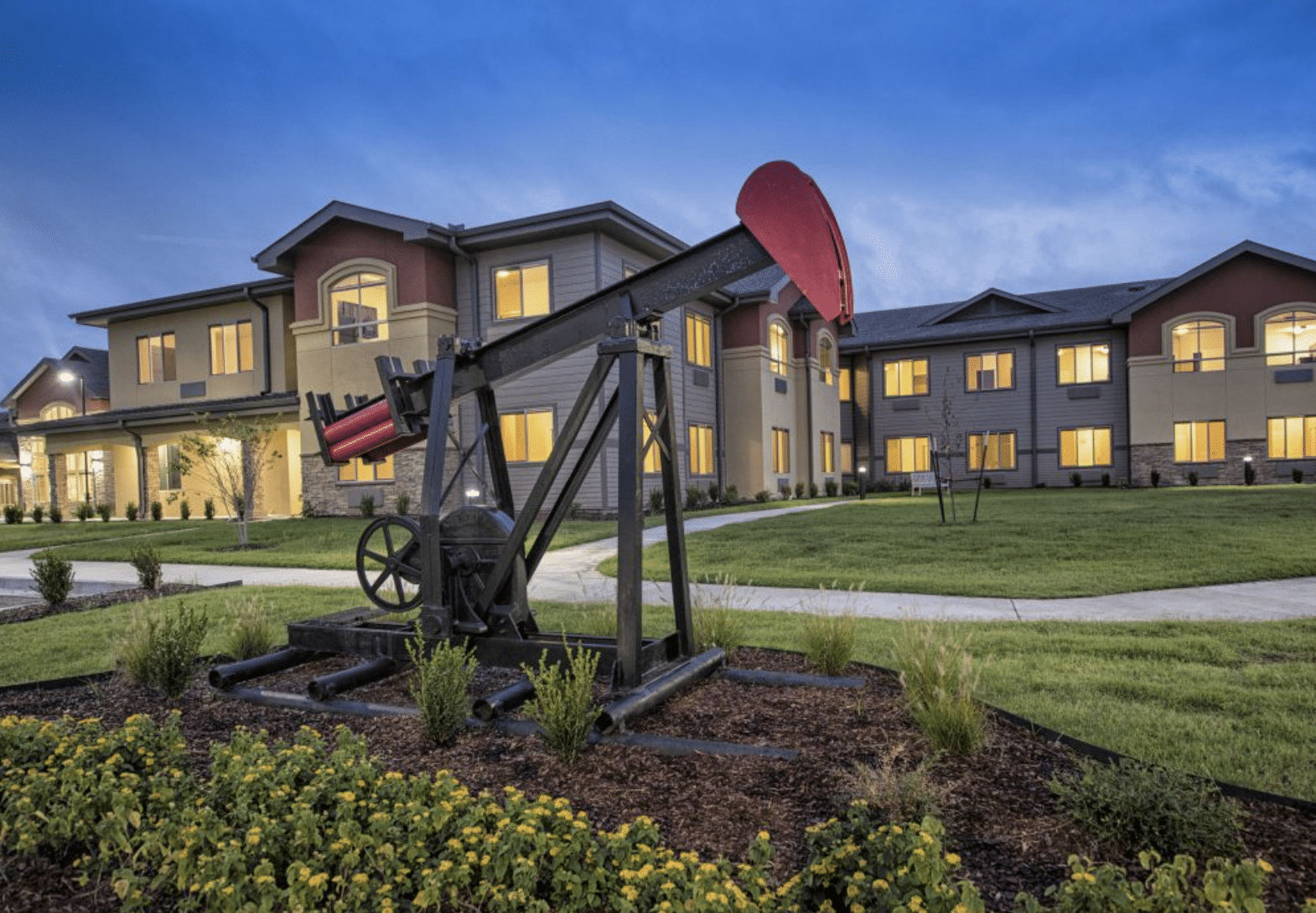 Senior living community in Tulsa, Oklahoma, with a restored oil pump jack on the lawn