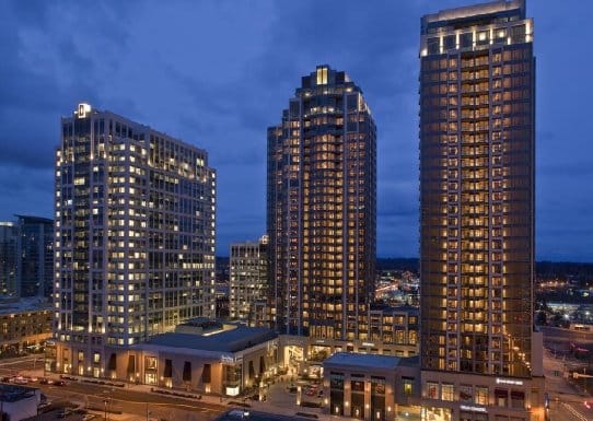 The Bravern towers in Bellevue, Washington, lit at night